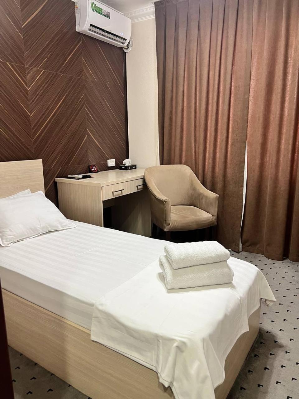 Orzu Hotel Namangan Bagian luar foto