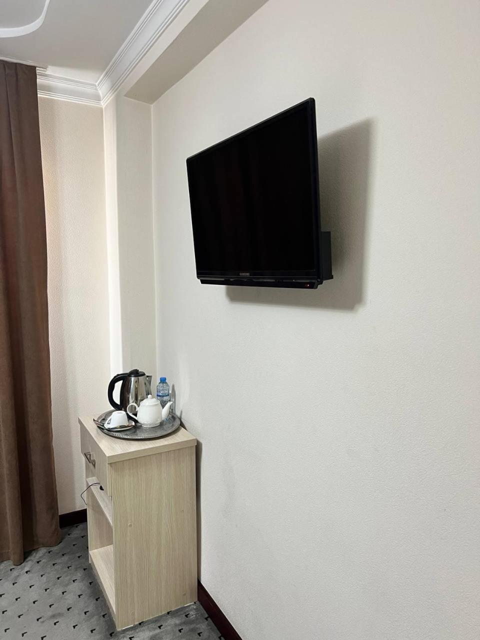 Orzu Hotel Namangan Bagian luar foto